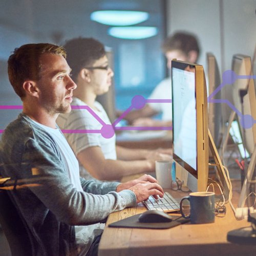 GNP Vonage Network Registry Thumbnail Photo of several developers working at their computers.