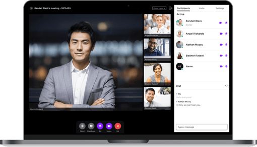 Laptop  showing Vonage Meetings screenshot, with man on large view and  tiles of other 4 participants,  plus the chat  on the right Laptop  showing Vonage Meetings screenshot, with man on large view and  tiles of other 4 participants,  plus the chat  on the right